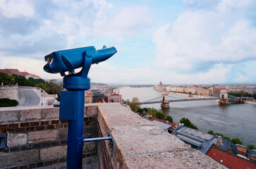 Wall Mural - Coin Operated Binocular viewer in Budapest looking out to the river and city.