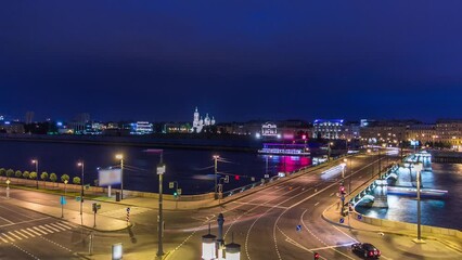 Wall Mural - Malaya Neva River, showcasing Birzhevoy (Exchange) Bridge. From a rooftop vantage point night timelapse of dynamic traffic, church and the cityscape of St. Petersburg, Russia