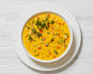 Canvas Print - Beer cheese soup with vegetables and thyme