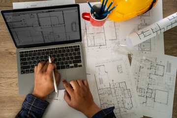 Poster - Man, architect, and engineer work discussing tools and construction concepts on a building site with blueprints for a professional construction job and building contractor development.