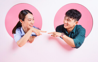 Wall Mural - Photo of young Asian couple on background