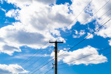 Power electric pole with line wire on colored background close up