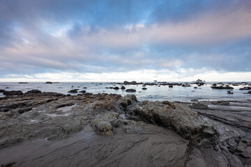 Wall Mural - Sunrise over seastacks at Rialto Beach in Olympic National Park.