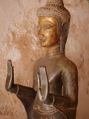 Wall Mural - Golden buddha statues, Buddha statue at the ancient temple, peaceful image of a Buddha statue, ancient buddha statues south east asia