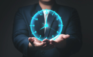 Fototapete - Businessman showing a virtual clock in his hand. Concept of saving time, overtime (OT), work hours of employees in organization, and Efficient work schedule management