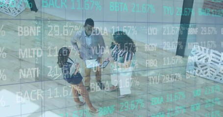 Poster - Animation of trading board over high angle view of diverse coworkers discussing reports