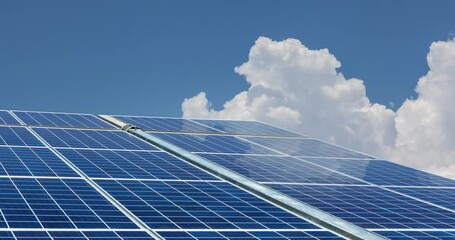 Wall Mural - time lapse photography video of the clean energy of solar power with blue sky and white clouds, new energy landscape