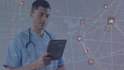 Poster - Animation of connected icons forming globes and grid over caucasian male doctor using tablet