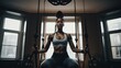 © Suleyman - An athletic black woman works out at home on fitness equipment