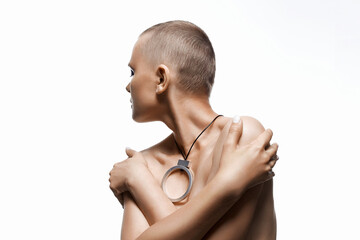 Wall Mural - beautiful woman with short haircut. naked bald girl with necklace
