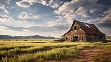 Abandoned Rustic Barn In The Heart Of A Rolling Meadow