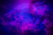 Red smoke on a blue background. Mystic texture in neon colors