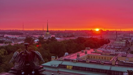 Wall Mural - Sunrise timelapse with rain over St. Petersburg's historic center from St. Isaac's Cathedral colonnade. Admiralty Building, Palace Square, Winter Palace, Peter and Paul Fortress stand in the distance