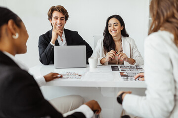 HR workers hiring two female candidates, making employment deals, signing work contract after successful job interview