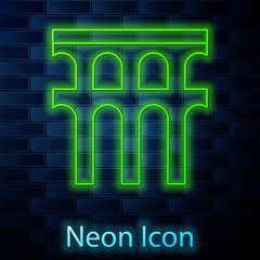 Poster - Glowing neon line Aqueduct of Segovia, Spain icon isolated on brick wall background. Roman Aqueduct building. National symbol of Spain. Vector