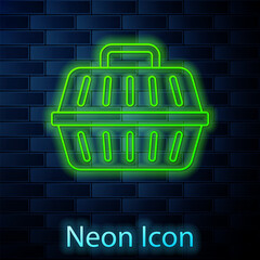 Sticker - Glowing neon line Pet carry case icon isolated on brick wall background. Carrier for animals, dog and cat. Container for animals. Animal transport box. Vector