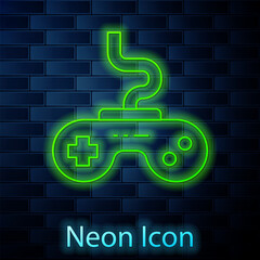 Poster - glowing neon line gamepad icon isolated on brick wall background. game controller. vector