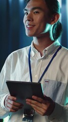 Poster - vertical video licensed programmer strolling through server rows providing processing resources for 