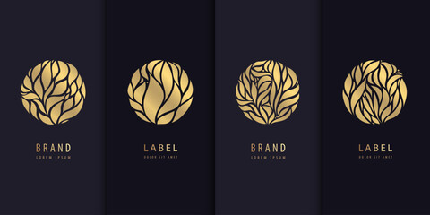 Wall Mural - Vector set of golden floral circle logos, leaves labels. Package design, nature concept for beauty products, organic and eco icons