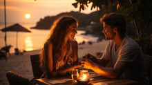 Young Couple Dating On The Beach At Sunset. Romantic Evening Date.