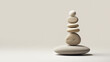 © Garnar - Stone Zen concept. Balanced rock stacks convey tranquility and harmony. Reflection of meditation, mental equilibrium, and serenity. Neutral, monochromatic palette, beige background. Copy space