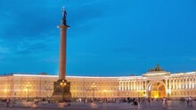 Nighttime Illumination Of Alexander Column On Palace Square Timelapse, St. Petersburg. Revealing The Enchanting Night Scene Of The Historical Center In Saint Petersburg With Its Architectural Splendor