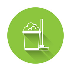 Sticker - White Mop and bucket icon isolated with long shadow background. Cleaning service concept. Green circle button. Vector