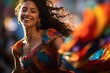 Beautiful young woman in a colorful dress dancing flamenco