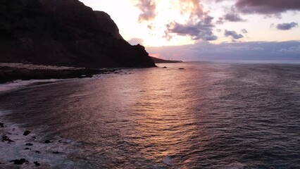 Wall Mural - Aerial sunset light over ocean and volcanic cliffs of Tenerife Canary Island Spain