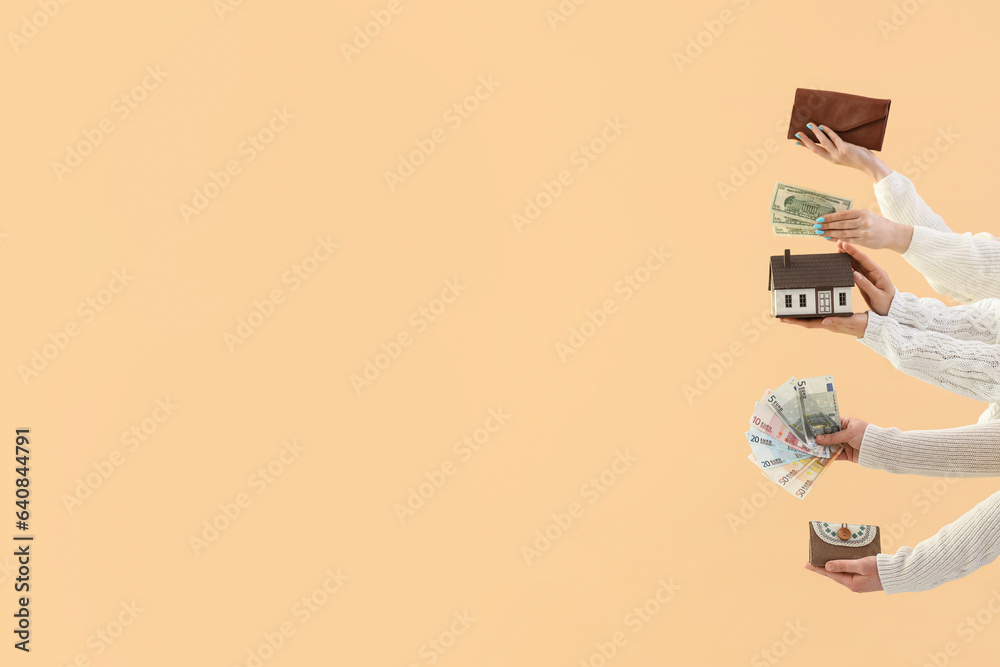 Women with money, wallets and house model on beige background