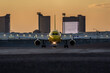 Yellow airplane is preparing for take off in Harry Reid airport in Las Vegas