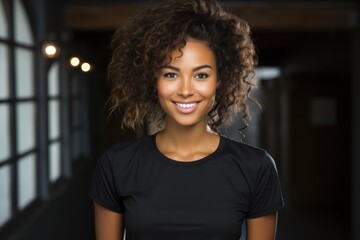 Wall Mural - headshot of an attractive black young woman looking at the camera 