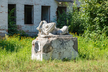 Broken Concrete Pioneers Sculpture In Abandoned Soviet Pioneer Camp. Pioneer Statue In Abandoned Camp.