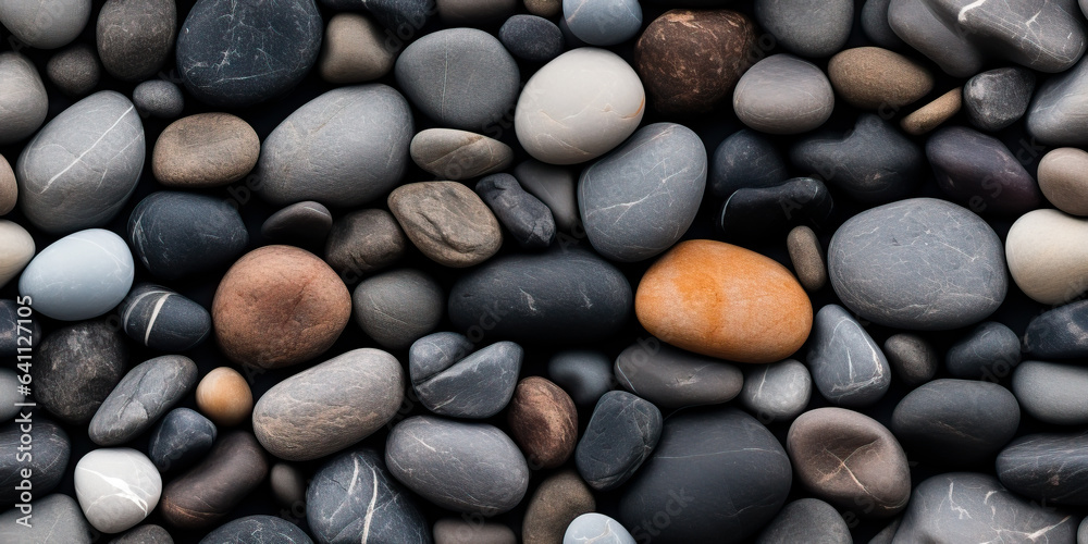 River rocks or stones in a seamless tiled pattern. Naturally polished ...