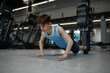© Nomad_Soul - Teenager healthy boy making gymnastics pushup while training at gym