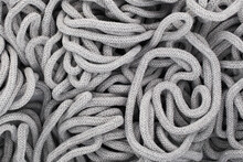 Rope Texture. Gray Rope Messy Background. Random Shape Pile Of Rope. Spiral Loop. Abstract Textile Pattern. Cotton Rope Background.