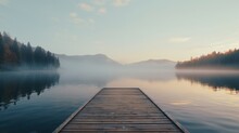 Woodenpier Or Jetty On Lake At A Foggy Sunrise. Relax, Vacations, Or Work Life Balance Theme