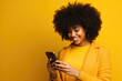 © Andrii  - Online Social Networking: African American Woman Messaging