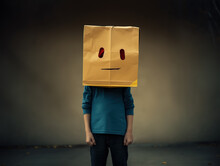 Sad Little Child Holding Paper Bag Over His Head