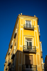 Wall Mural - Unique old yellow building in the old quarter of Cartagena, Region of Murcia, Spain,