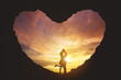© Creativa Images - Silhouette of kissing couple in a heart shaped cave