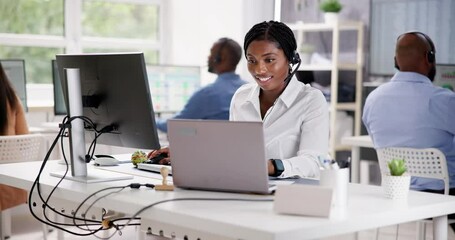 Wall Mural - Portrait Of A Smiling African Female Customer Service