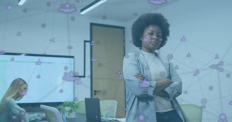 Poster - Animation of network of digital icons over african american woman with arms crossed at office