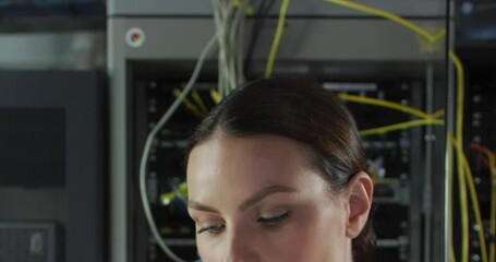 Poster - Animation of data processing over close up of caucasian female engineer working at server room