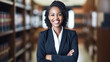 Portrait, lawyer and young black woman smile and happy in office workplace. African attorney, technology and face of professional, female advocate and legal advisor in law firm.
