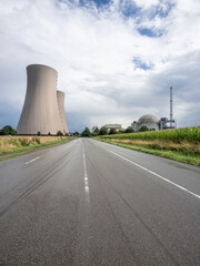 Green landscape and nuclear power plant.