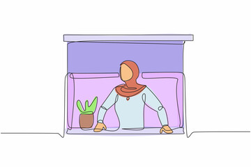 Poster - Single one line drawing surprised Arab businesswoman looking outside window. Stay at home during covid-19. Woman with plant watching out the window. Continuous line graphic design vector illustration