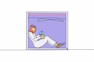 Poster - Single one line drawing young Arab man sitting on windowsill with smartphone and coffee, enjoying rest at home. Comfortable relax time with hot drink. Continuous line draw design vector illustration