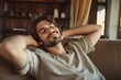 © Mateusz - man relaxing on sofa