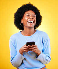 Poster - Woman, laugh and typing on smartphone in studio, reading funny social media post and mobile news on yellow background. Happy african model, cellphone and joke of meme, multimedia notification or tech
